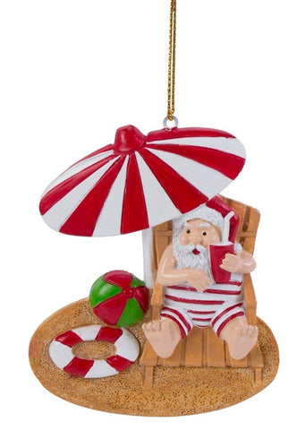 Santa Soaking Up The Sun on the Beach Ornament